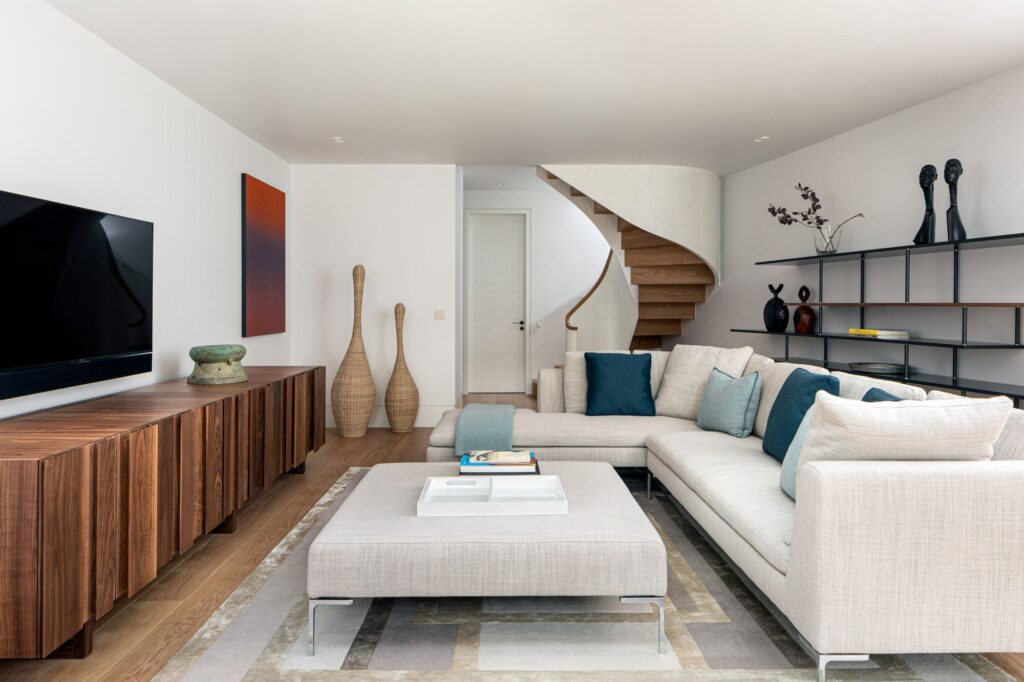 Ladbroke Square — A curved stair and full loft conversion in a Notting Hill garden square, with light borrowed through internal glazing.