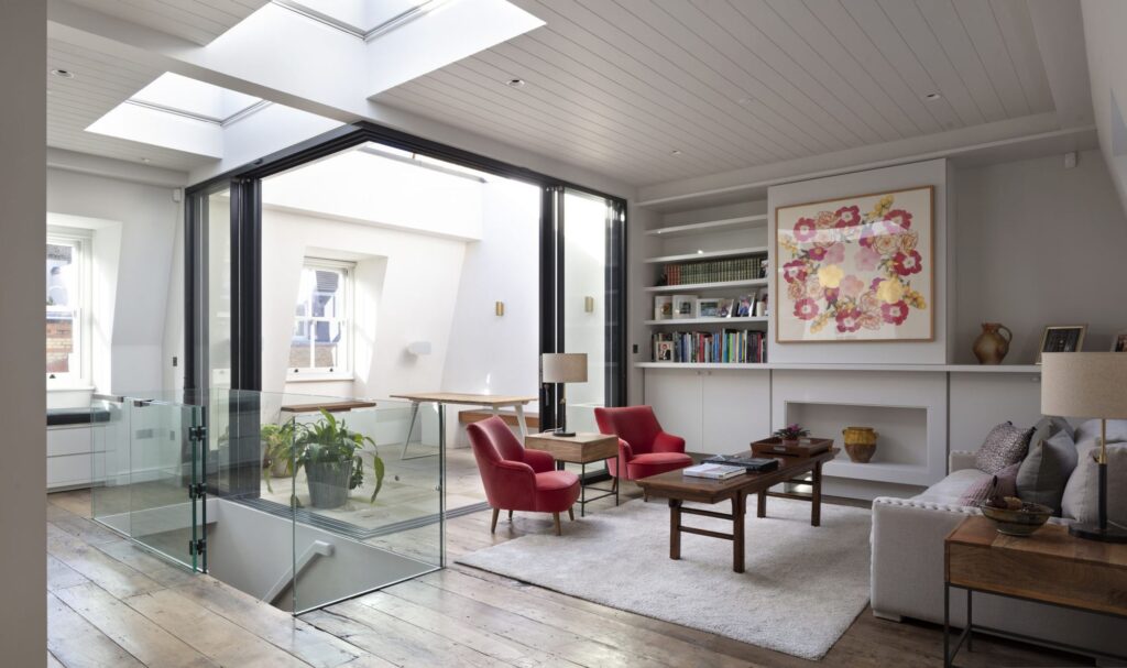 Mews House — A mews house reworked around light, with a cantilevered stair and a full basement build beneath.